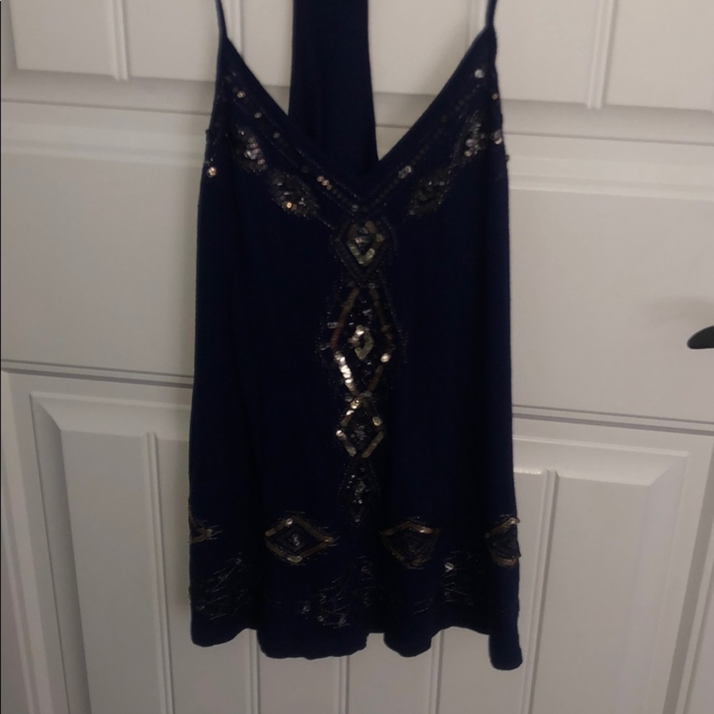 Super cute tank top with sequin design!